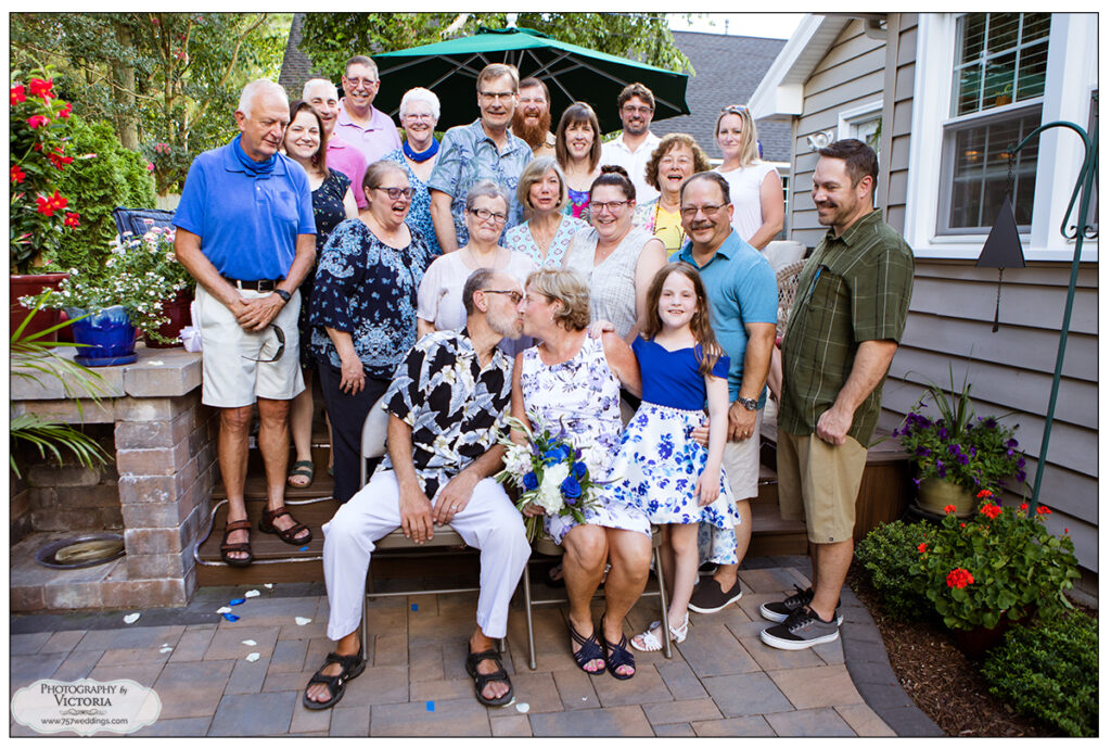 Barbara and John of Virginia Beach, VA wed in their backyard on July 10, 2020. Ceremony officiated by Reverend Bruce Begault and photographed by Victoria Begault.
