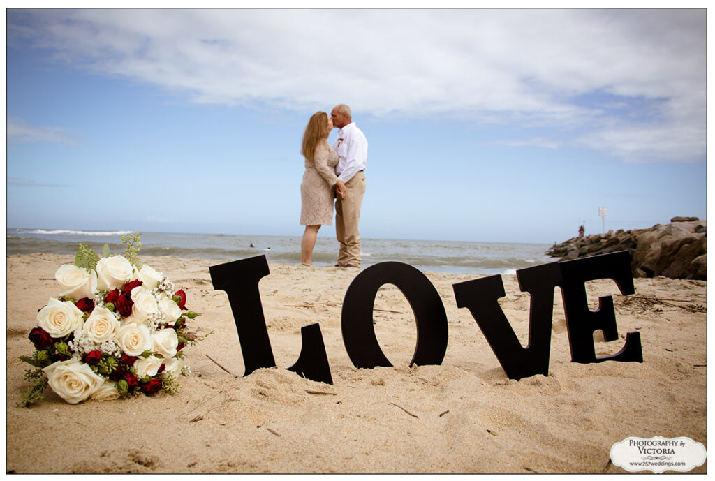 Theresa and Chris' September 2020 Virginia Beach oceanfront wedding in September 2020. Ceremony officiated by Reverend Bruce Begault and flowers and photography by Victoria Begault.